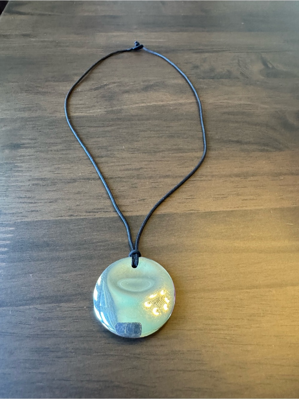 Tiffany & Co. Silver Pendant on Black Cord